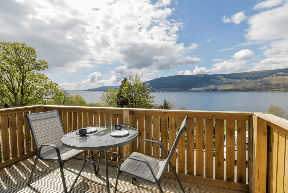 Private deck with table for two and far-reaching Loch Long views at 11A Mansion View