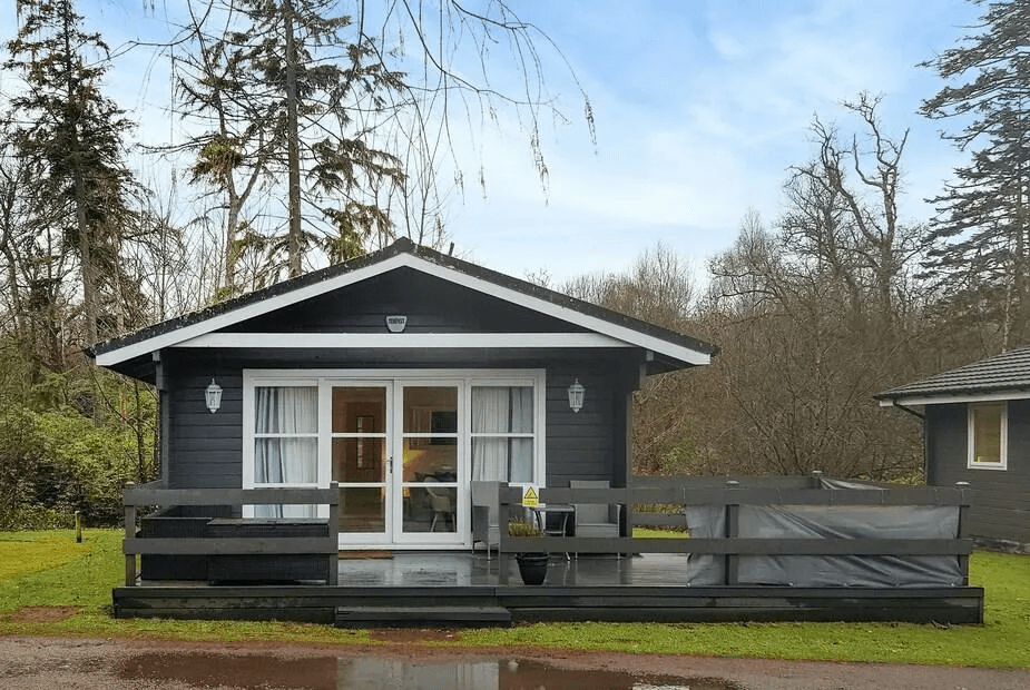 Leven Lodge 1 timber-clad exterior with private hot tub on the deck, Alexandria